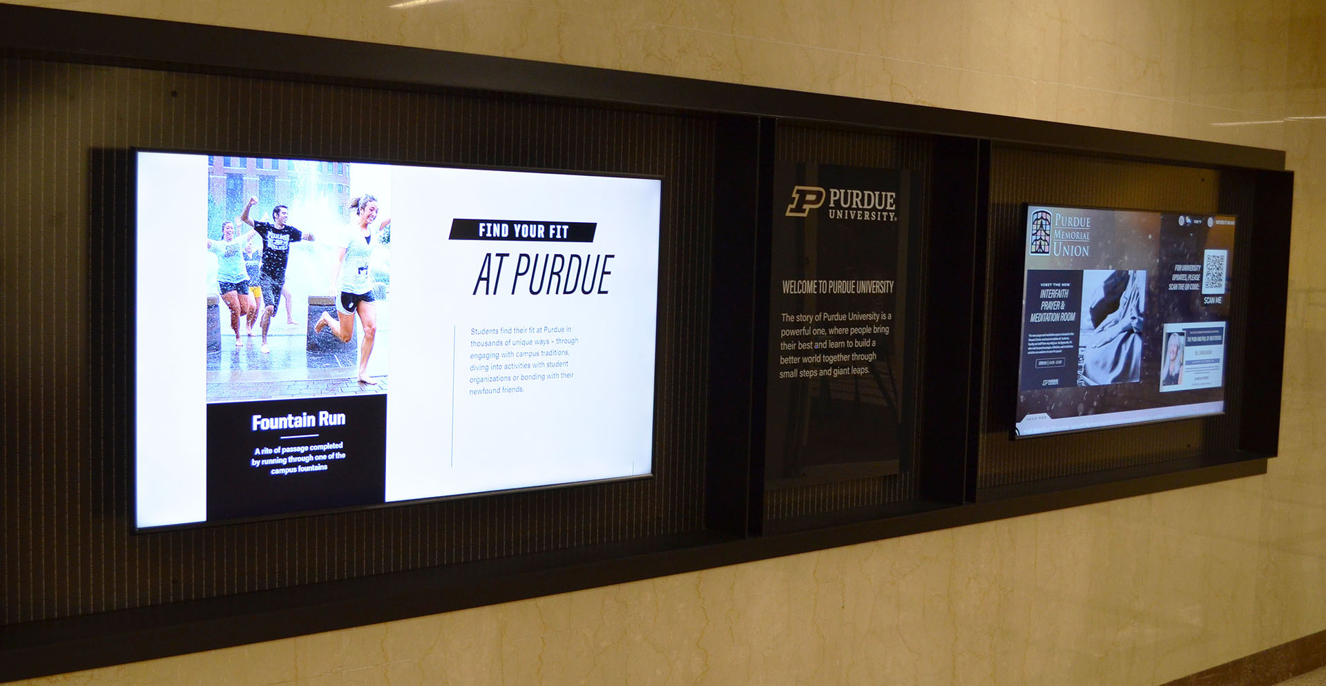 Example of digital signage on a wall with multiple displays